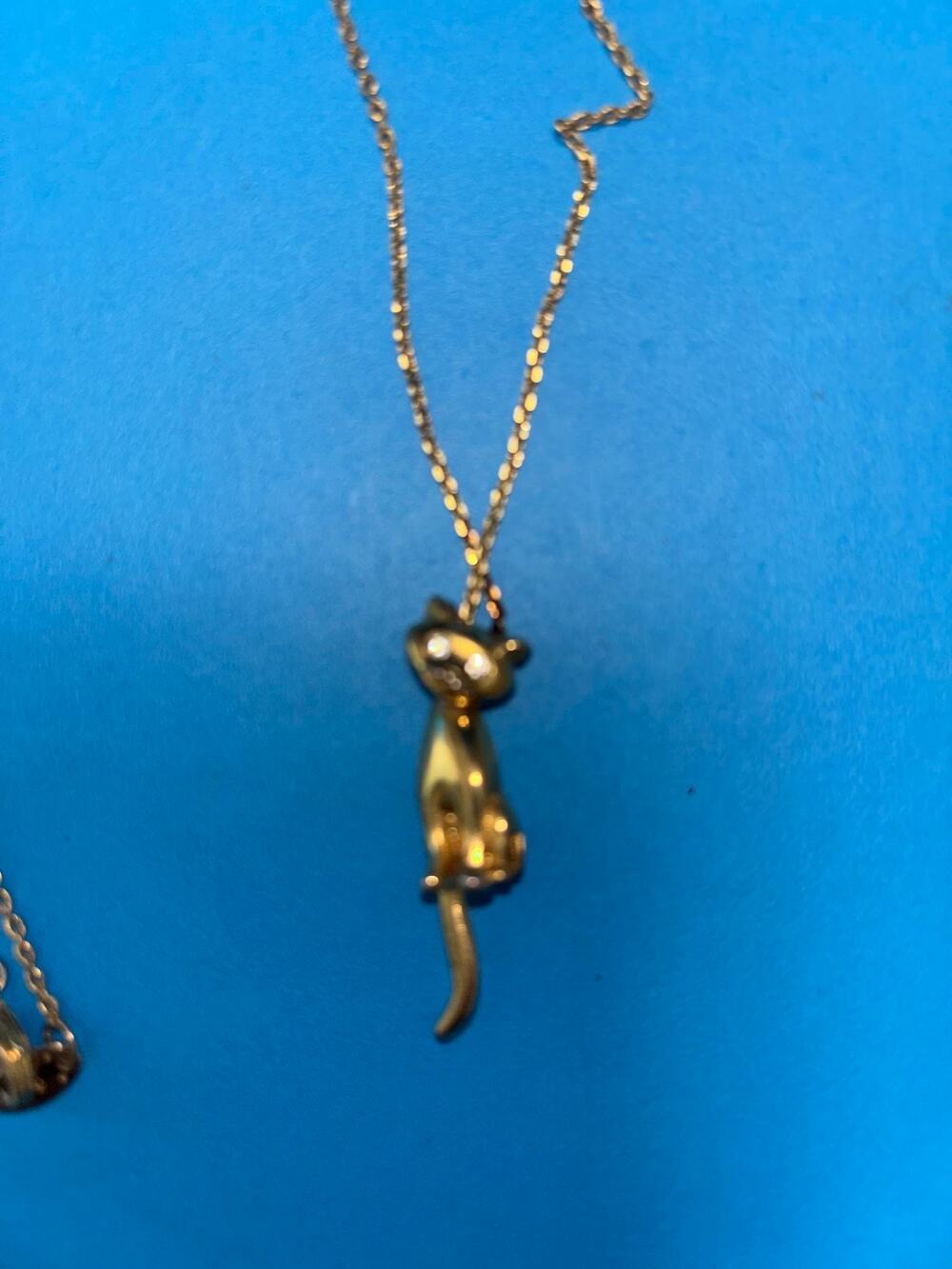 Vintage Avon Articulated Moveable Cat Pendant Necklace Rhinestone Eyes Gold Tone
